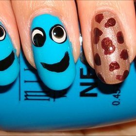 Cookie Monster Nails
Nail tutorial & more photos here: http://www.swatchandlearn.com/nail-art-tutorial-cookie-monster-nails/