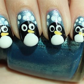 Penguin Nails
Nail tutorial & more photos here: http://www.swatchandlearn.com/nail-art-tutorial-penguin-nails/