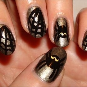 Spider & Web Nails
Nail tutorial & more photos here: http://www.swatchandlearn.com/nail-art-tutorial-spider-web-nails/