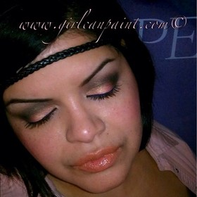 This look was done using Mac Angel Flame Quad along with the products below I also used Miliani Multitasker Face Powder - #05 Tan
Paint Pot - Coral Crepe
Stila smudge pot in Violet
Stila glaze lip liner -brown





