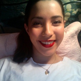 NARS Semi-Matte Red Lizard lips covered with a gloss I can't remember.