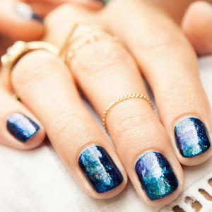 galactic effect of this design. First, gradate your nails from blackened
