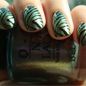 OPI Not Like the Movies with zebra nail stamping from Konad Image Plate m57
More photos here: http://www.swatchandlearn.com/opi-not-like-the-movies-swatches-review-konadicure/