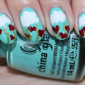 Valentine's Day Nails with Clouds, Lightning & Hearts!
See the tutorial & more photos here: http://www.swatchandlearn.com/nail-art-tutorial-valentines-day-nails/