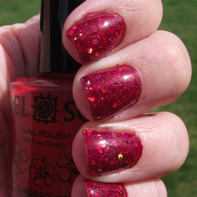 Peek A Boo glitter sandwiched with OPI Servin Up Sparkle :) Sooooo pretty!!! 
http://polishmeplease.wordpress.com for details