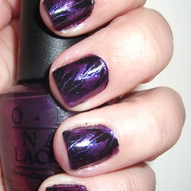 Black and Purple Feather Nails