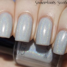 Glitter Gal Light as a Feather

http://samariums-swatches.blogspot.com/2011/12/glitter-gal-light-as-feather-suede.html