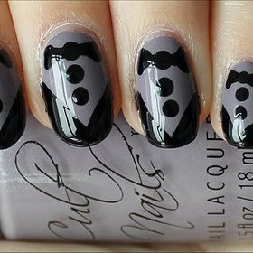 Tuxedo Nails
Nail Tutorial & More Photos Here: http://www.swatchandlearn.com/nail-art-tutorial-tuxedo-nails/