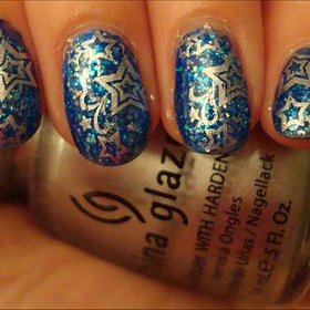 Shooting Star Nails
More photos here: http://www.swatchandlearn.com/nail-art-shooting-star-konadicure-using-opi-last-friday-night-bundle-monster-image-plate-bm21/