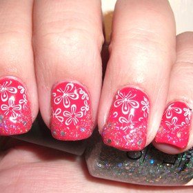 If Barbie liked coral instead of pink, these would be her nails. A coral stamped, chevron, glitter monstrosity!