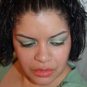 Green & Gold with a touch of coral on the lips