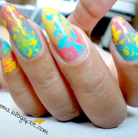 For a tutorial or to see what polish I used, you could check my blog http://justtisems.blogspot.com/2012/05/nails-done-oh-yeah-check_22.html