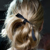 Sometimes it just takes a simple piece of ribbon to give a hairstyle charm and character {via pinterest}