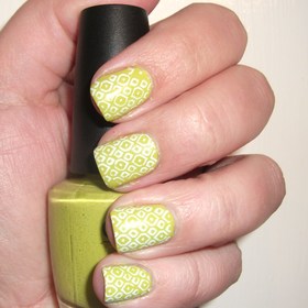 OPI Did It On Em with a fun geometric pattern stamped on them in white :)
http://polishmeplease.wordpress.com