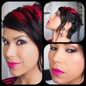 I created this look for Nymphette's April FOTD Challenge Calendar, the theme was "Bold Lip". Just a simple nude/grey smokey eye with heavy liner and MAC's Quick Sizzle lipstick.