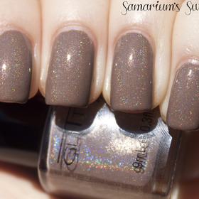 Glitter Gal Suede 

http://samariums-swatches.blogspot.com/2011/12/glitter-gal-light-as-feather-suede.html
