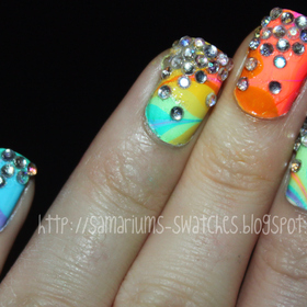 http://samariums-swatches.blogspot.com/2011/08/my-katy-perry-concert-nails.html