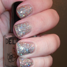 Del Sol Peek A Boo glitter sandwiched with OPI Servin Up Sparkle