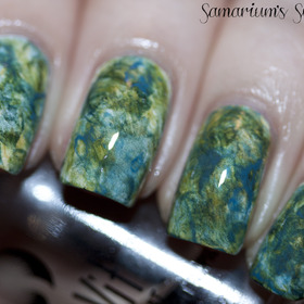 Water color Mani

http://samariums-swatches.blogspot.com/2012/01/water-color-nails-mani.html