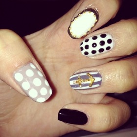 I never stick to a theme! Dots, Stripes, frames, steel balls! Stick it all on! Nail art Mash up lol!