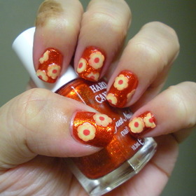 Hard Candy Lava and fimo flowers from Sally Beauty