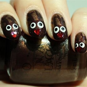 Reindeer/Rudolph Nails
Nail tutorial & more photos here: http://www.swatchandlearn.com/nail-art-tutorial-reindeer-nails-rudolph-nails/