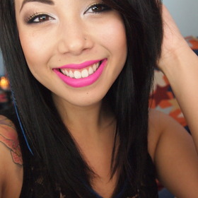 neutral eyes and bright pink lips 