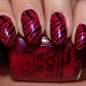 See more photos here: http://www.swatchandlearn.com/nail-art-pink-black-zebra-nails-using-konad-image-plate-m57/
