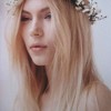 Loving pale garlands with the model's soft baby blonde locks. {via pinterest}