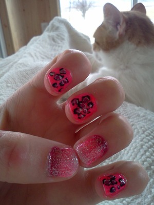 its my first time painting my nails with designs and more than one color so its a little sloppy! :)