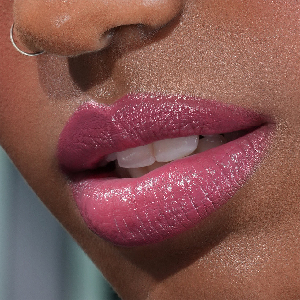 Natasha Denona model wearing the Berry Pop Lip Crayon and Lipstick