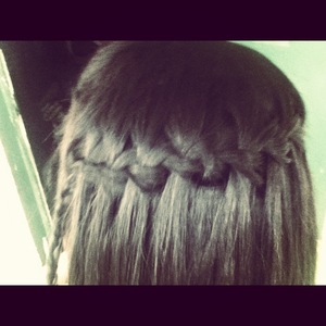 Beautiful waterfall braid, ends off with a fish tail.