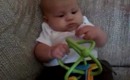 Harlan--playing with his toy @10 weeks old