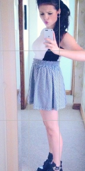 black and white checkered skirt (it's hard to see)