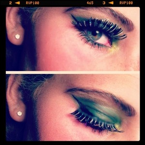 Green smokey eye with dramatic lashes