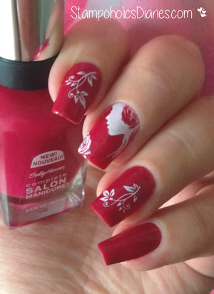 http://stampoholicsdiaries.com/2015/01/21/romantic-nails-with-sally-hansen-565-aria-red-y-and-marianne-nails-82/