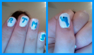 For Spirit Day at my school, I decided to do my nails! I painted all of my nails a white base coat, and used blue polish and a toothpick to dot on my school initials and mascot (a dolphin). I used black polish to draw the eye. :)