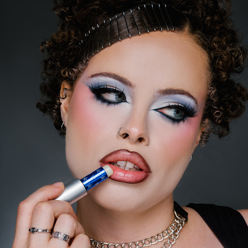 Model using Jeffree Star Cosmetics Lip Balm