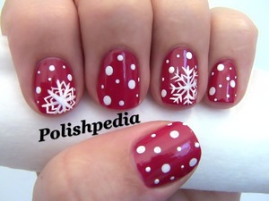 I love the snow in the Christmas season.  Now I love it on my nails.

Watch My Tutorial Video @ http://polishpedia.com/snowflake-nail-art.html