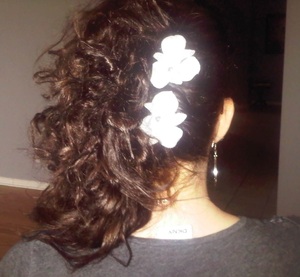 Side-swept pin curls with flowers by NattyDee
