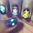 pointer: Van Gogh Starry Night middle: Mad Hatter ring: Hunger Games Mockingjay thumb: Gir