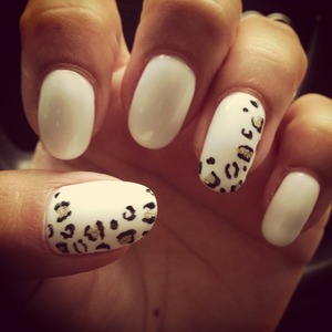 White shellac with gold and black leopard spots 