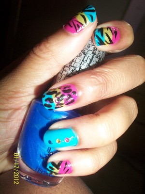 A lot of people liked this design .. i wasn't a big fan . Orly blue collar Revlon fuchsia and Finger paints yellow . 
