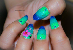 Detail Tutorial http://lovefornailpolish.com/easy-colorful-nail-art-idea-for-summer-dried-flowers-nail-art
