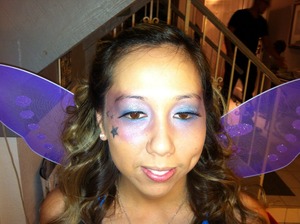 Purple and Blue fairy makeup with glitter stars.