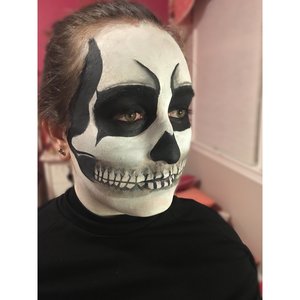 Used snazaroo face pants in black and white and some black eyeshadow 