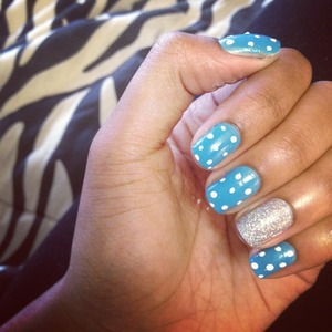I used blue nail polish and added white dots. I just used regular sparkle nail polish on my ring finger :)