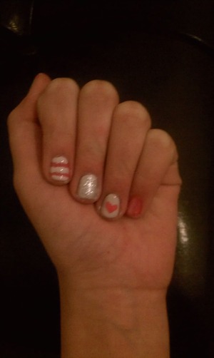 nails with hearts stripes and sparkles 