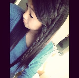 French braid on top into a normal braid.