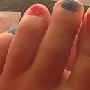 Pink nd blue toe nails x